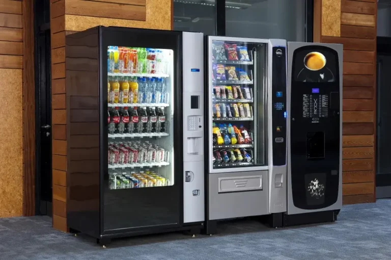 Modern dry snack vending machine in a bright office break room